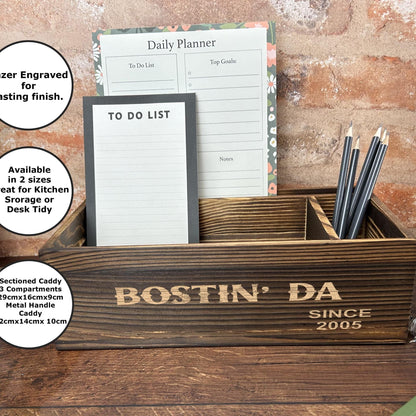 a desk with a wooden box with writing on it