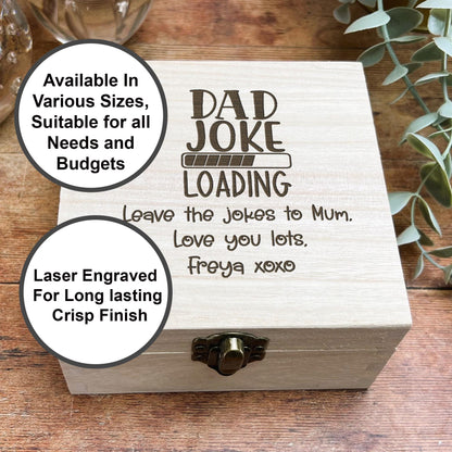 a wooden box with a picture of a joke on it
