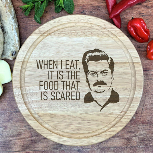 a cutting board with a picture of a man on it