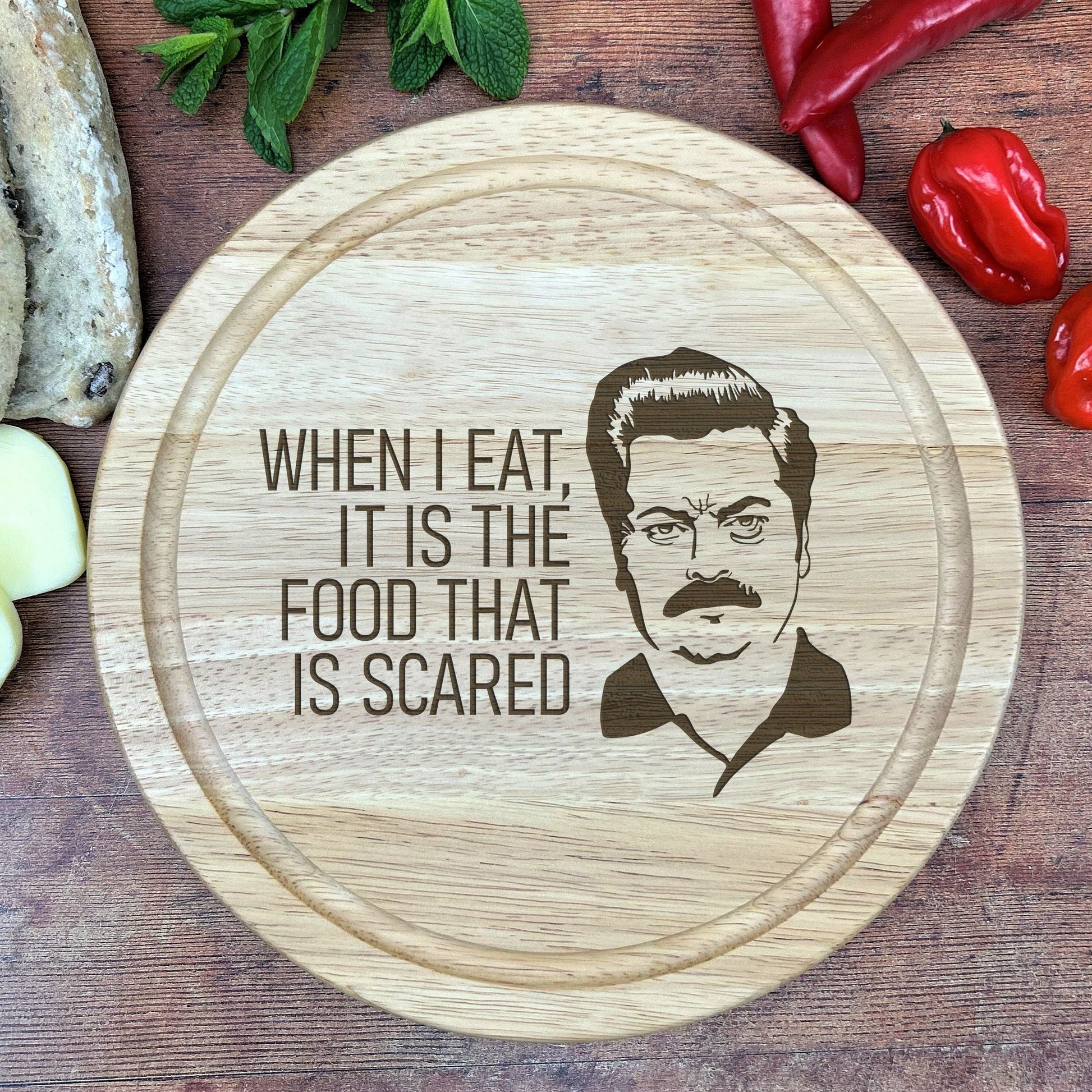 a cutting board with a picture of a man on it