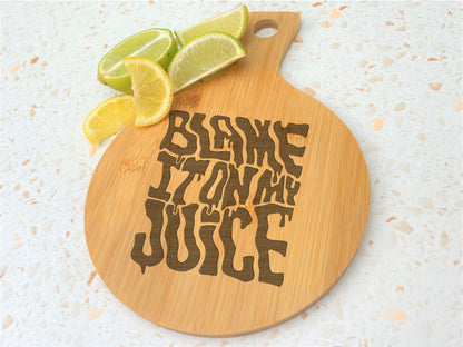 Lizzo Blame It On My Juice Bamboo Paddle Chopping Board