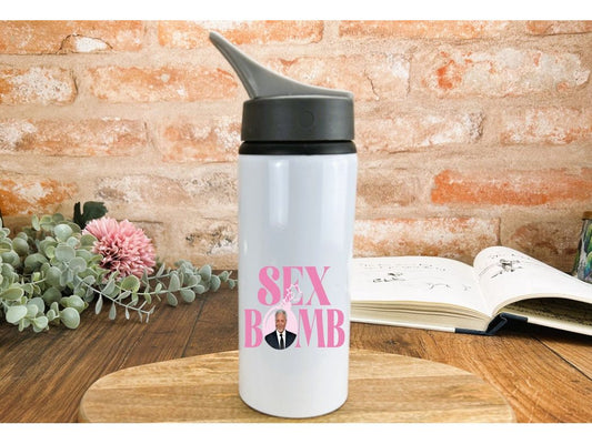 a white water bottle with a pink sex bomb sticker on it