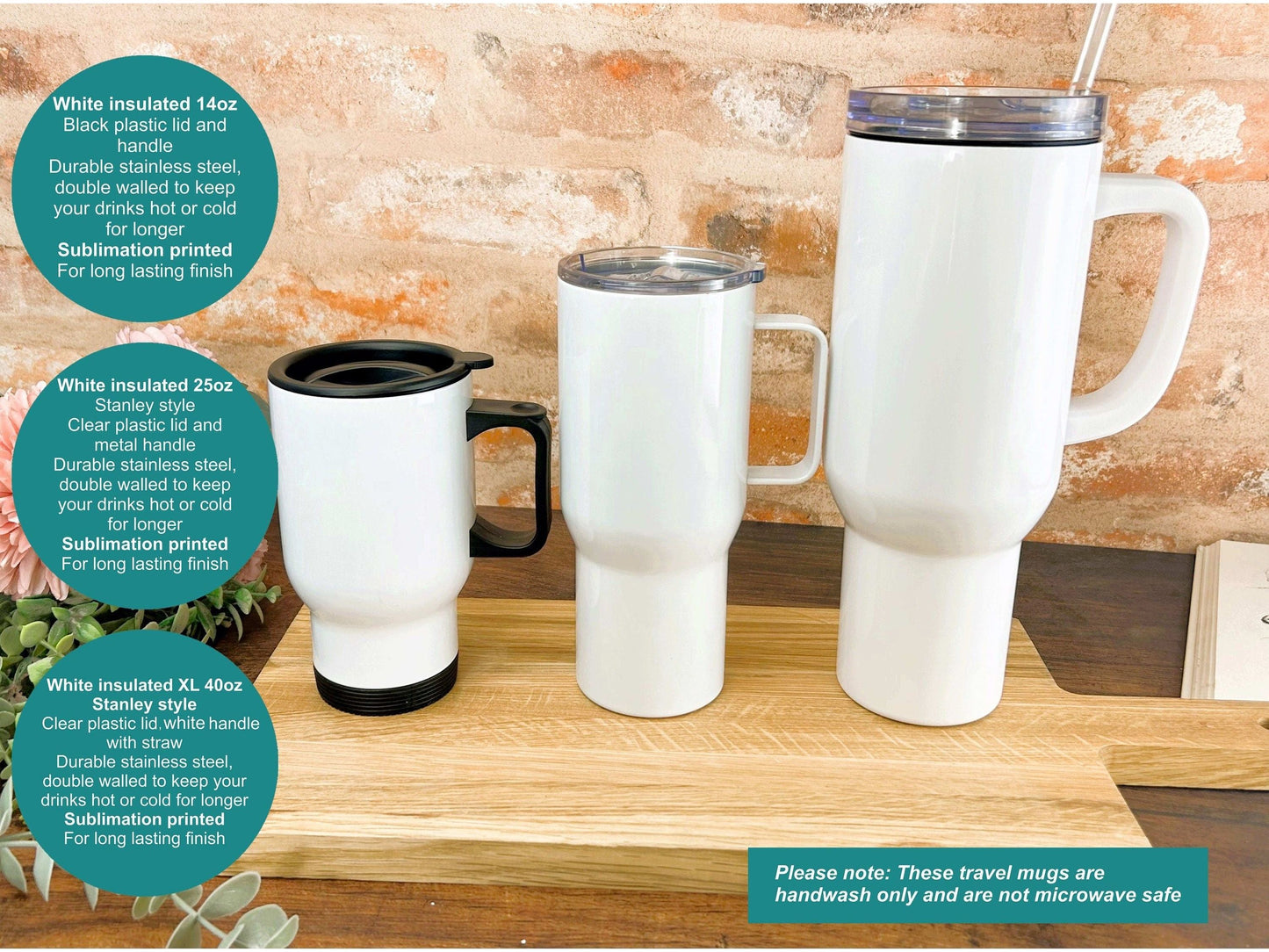 a couple of white coffee cups sitting on top of a wooden table