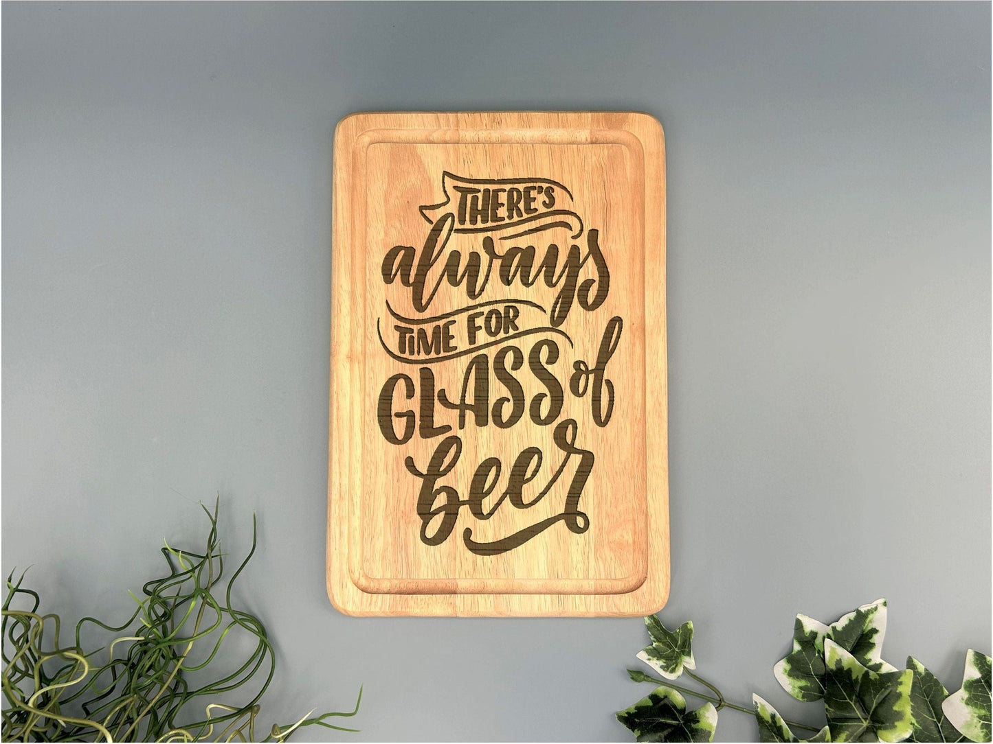 there&#39;s always time for glass of beer on a cutting board