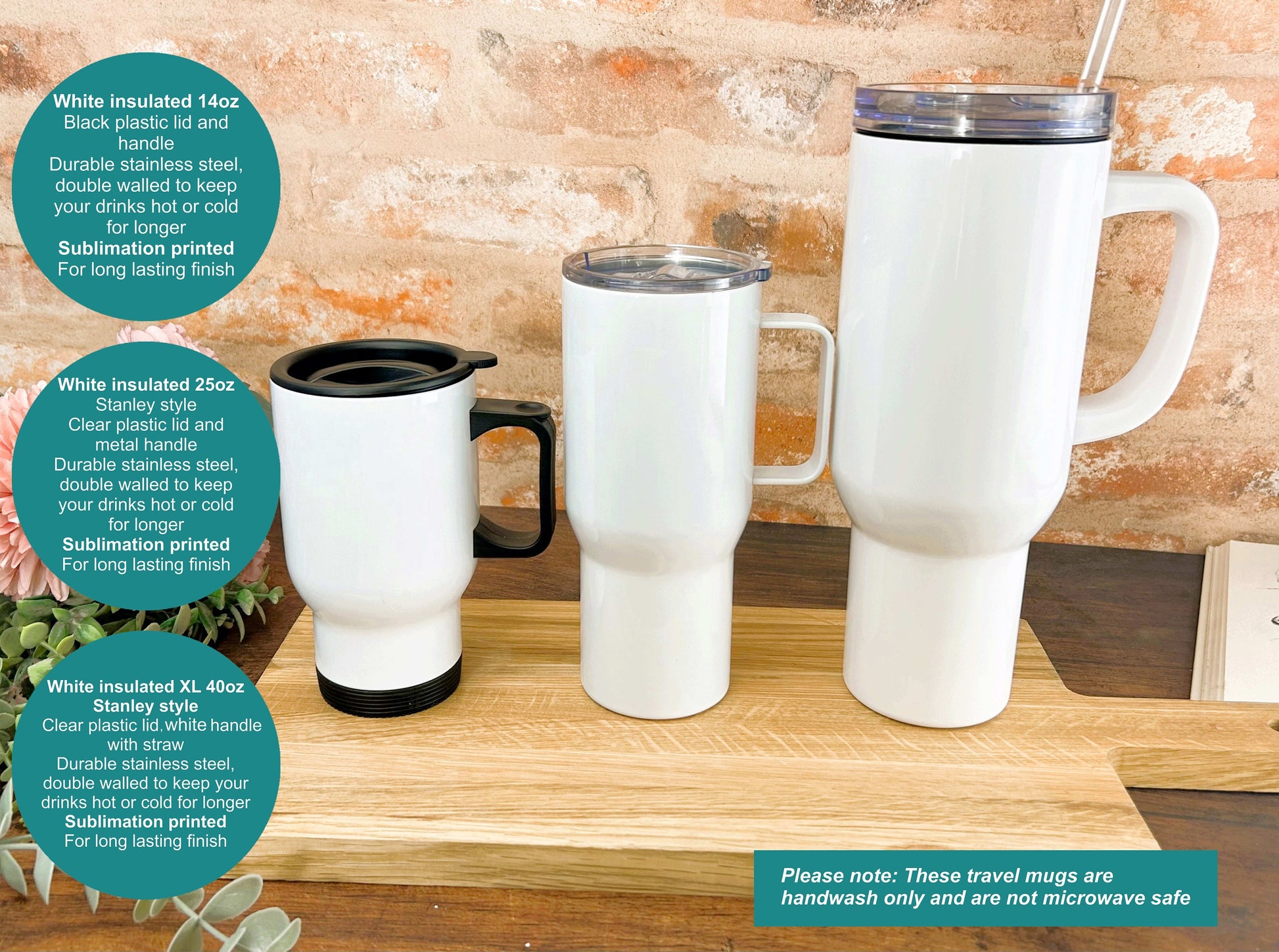 a couple of white coffee cups sitting on top of a wooden table