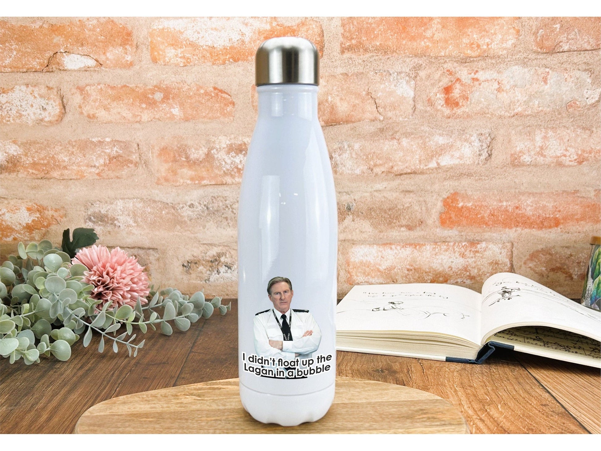 a water bottle with a picture of a man on it