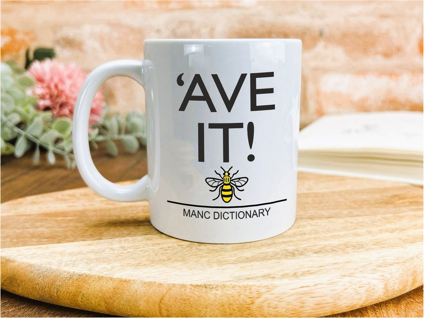 a white coffee mug with the words&#39;ave it&#39;on it