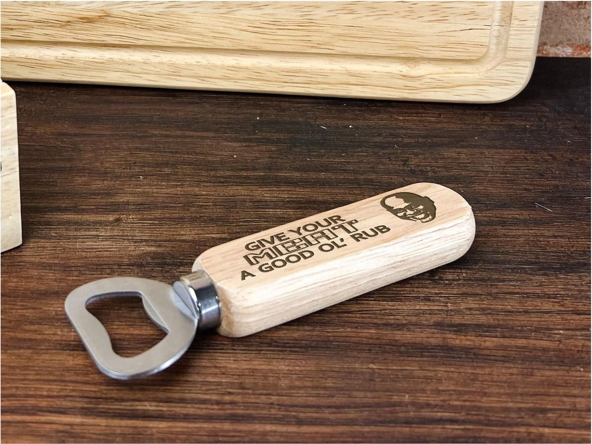 a bottle opener sitting on top of a wooden table