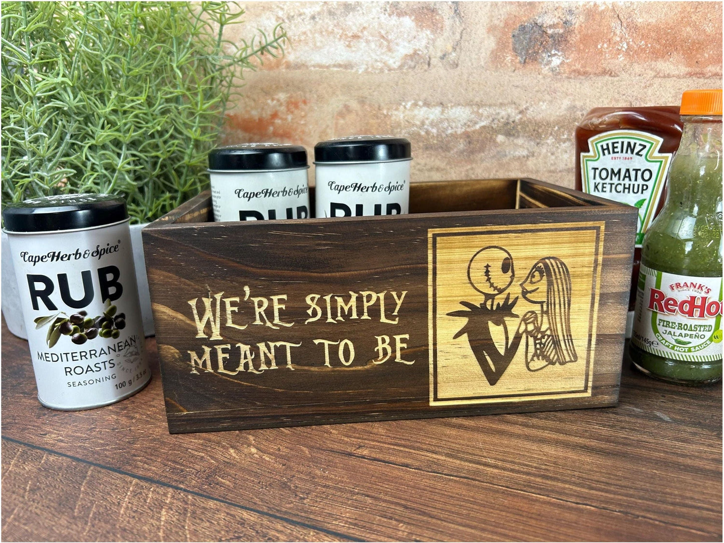 a wooden box with a sign that says we&#39;re simply meant to be